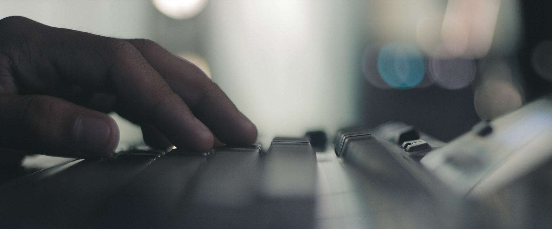 fingers on a keyboard